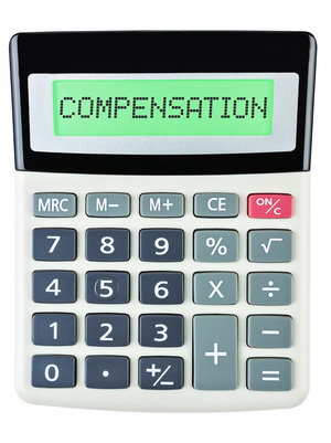 Calculator with COMPENSATION on display isolated on white